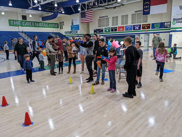 kids playing games at the Charlotte Family Weekend